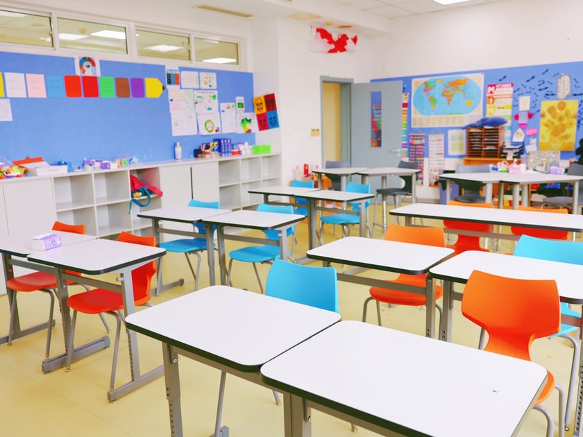 Academic Pressure on Students: Causes, Effects & Support 1 A bright, organized early-childhood classroom with colorful furniture and educational displays representing a structured school learning environment