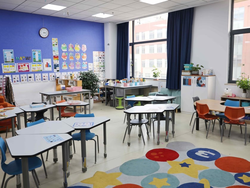 Leader in Me Program: How Schools Build Student Leaders 1 Bright, colorful early-childhood classroom with organized learning stations and educational displays on blue accent walls