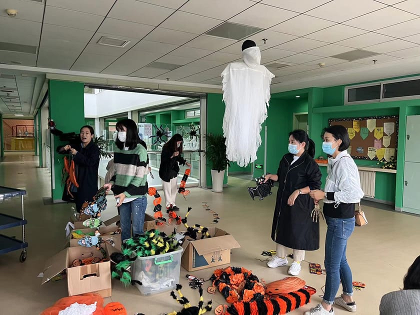 Student Council: Building Democratic Leadership Skills 1 Middle school students organizing a Halloween hallway display at QISS, a typical student council community event
