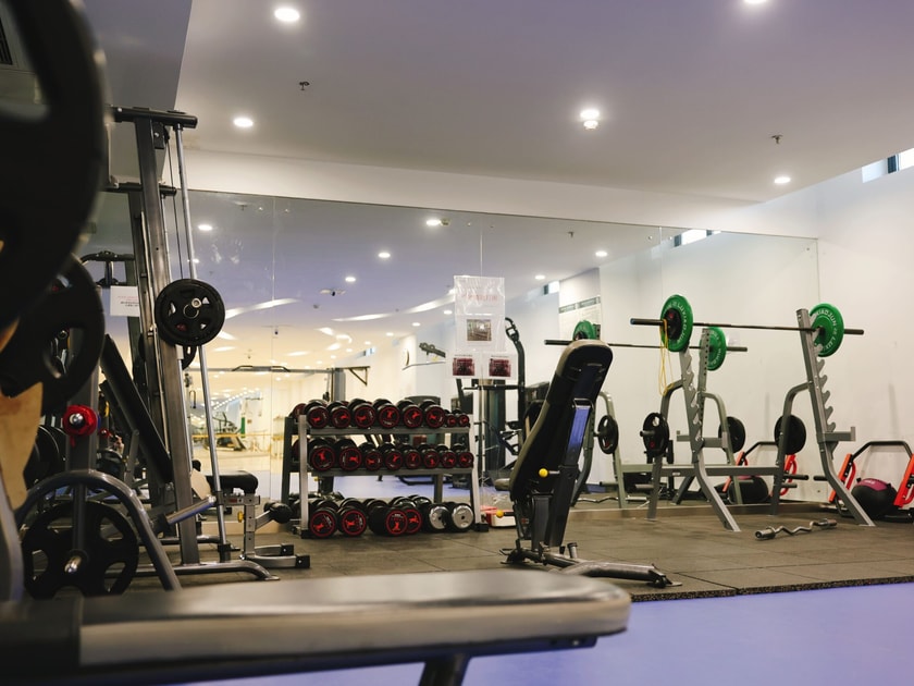 School Visit Tips: What to Look for on Campus 3 Modern school gymnasium with professional fitness equipment, reflecting long-term campus investment parents should evaluate during a school visit