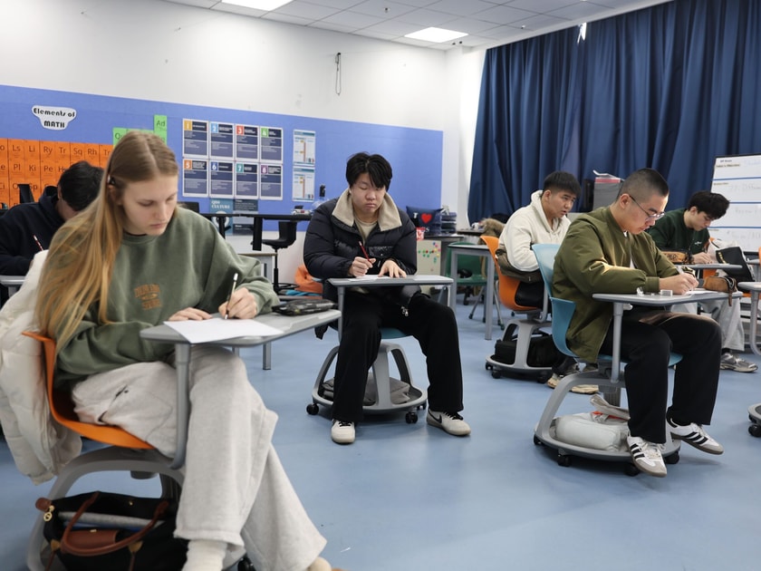Screen Time and Students: What the Research Shows 1 Middle school students working independently at mobile desks in a modern STEM classroom